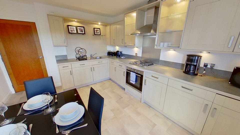 Apartment, 2 Bedrooms | Private kitchen | Fridge, microwave, dishwasher, coffee/tea maker