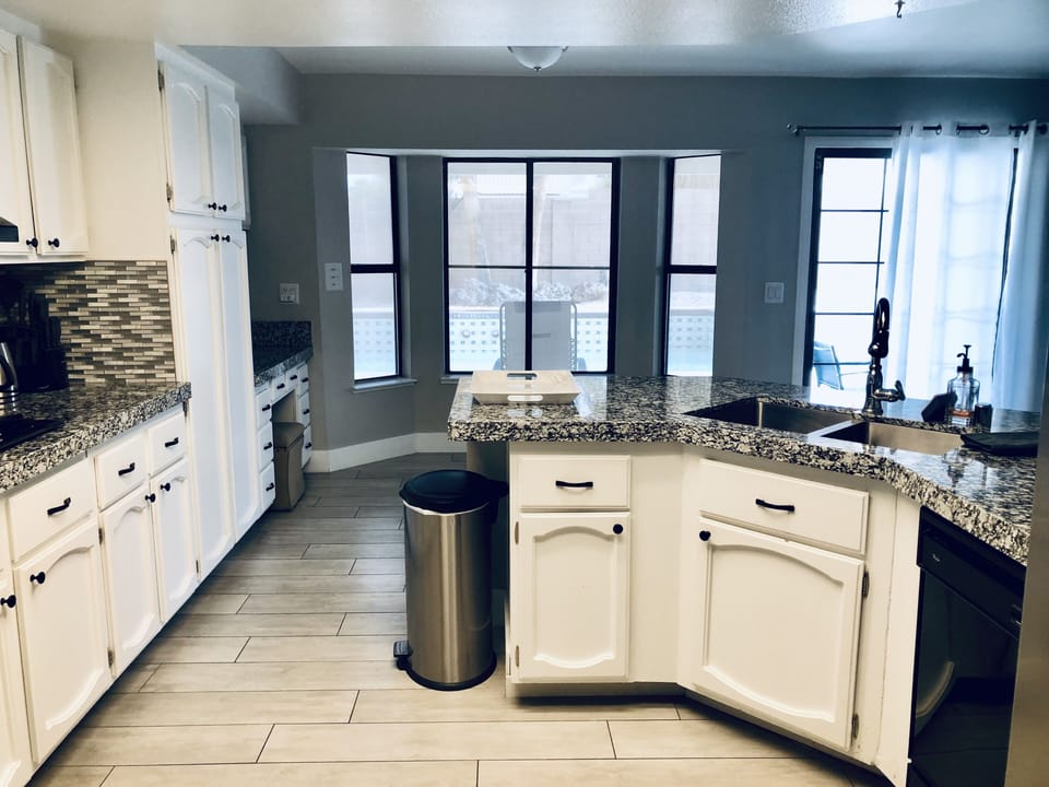 View of pool from Kitchen and Family room
