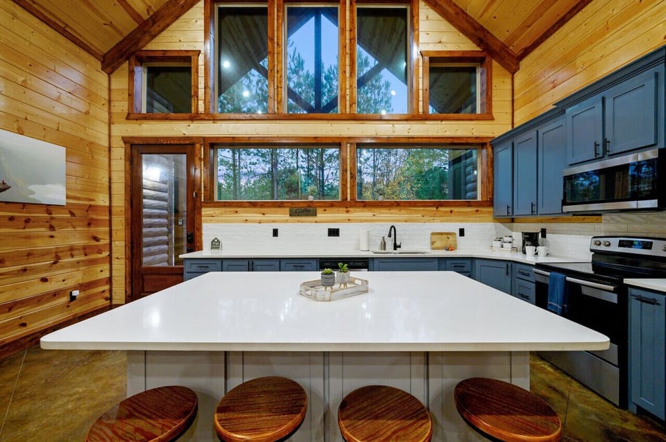 Our white countertop with cozy stools creates the perfect spot for casual dining.