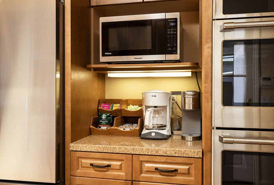 Enjoy the coffee and tea station complete with both Keurig and drip coffee maker.