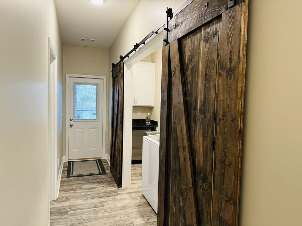 Laundry room, utility sink, & extra fridge