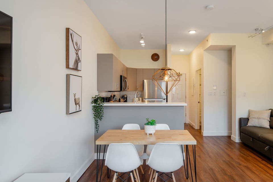 A bright, functional space for casual dining or laptop work.