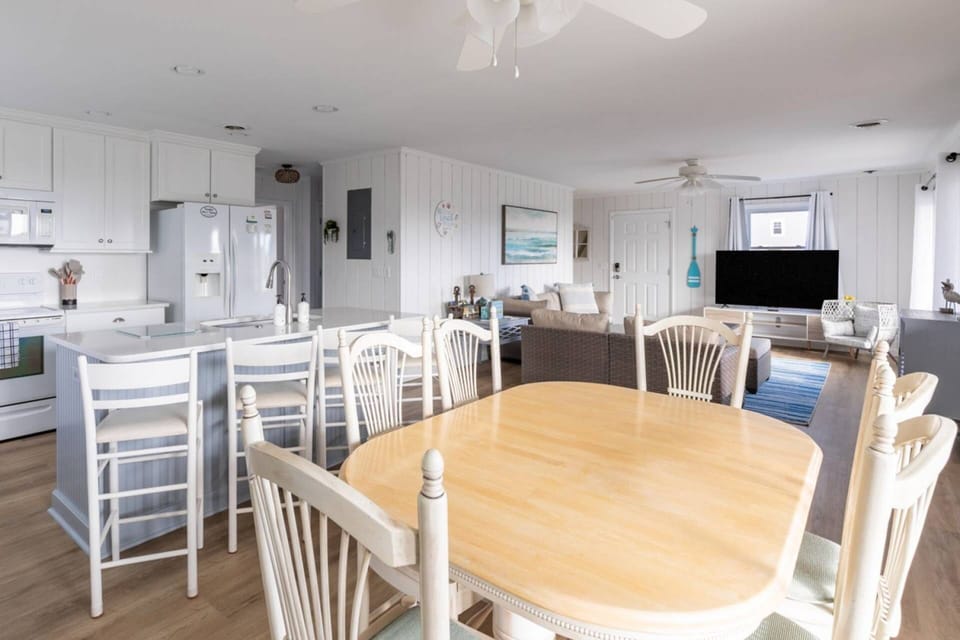 Dining table adjacent to kitchen