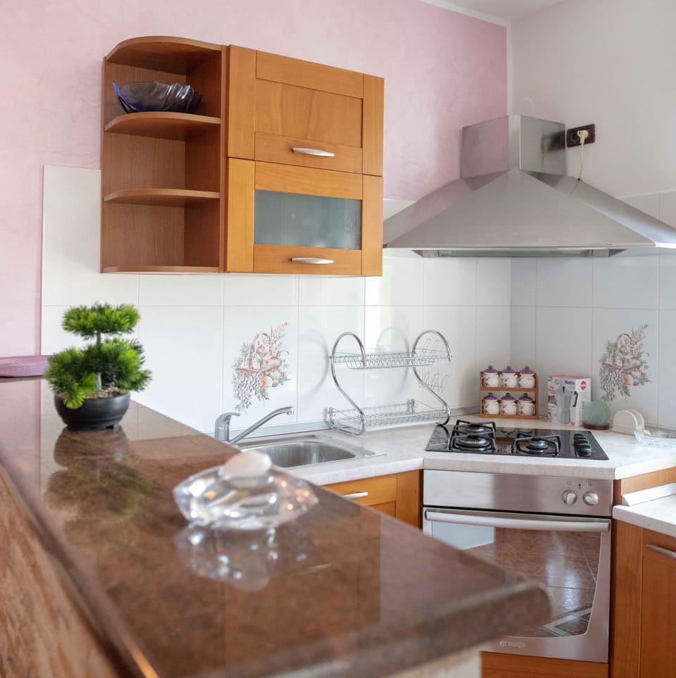 Apartment, 2 Bedrooms | Private kitchen | Full-size fridge, microwave, oven, coffee/tea maker