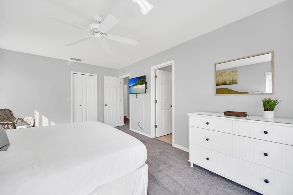 A second angle of the master, highlighting the spacious layout and serene atmosphere.