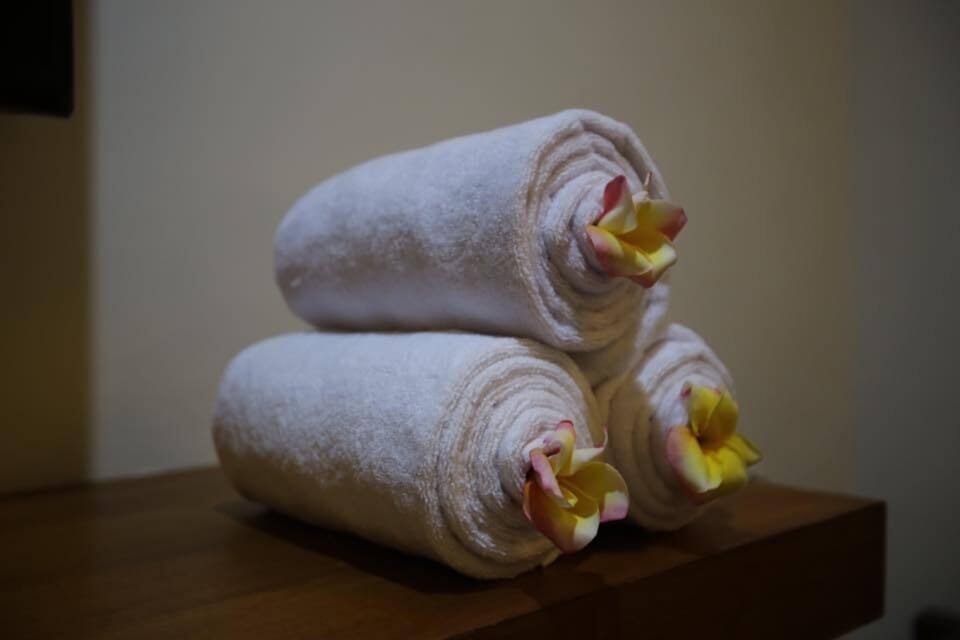 Shower, rainfall showerhead, towels