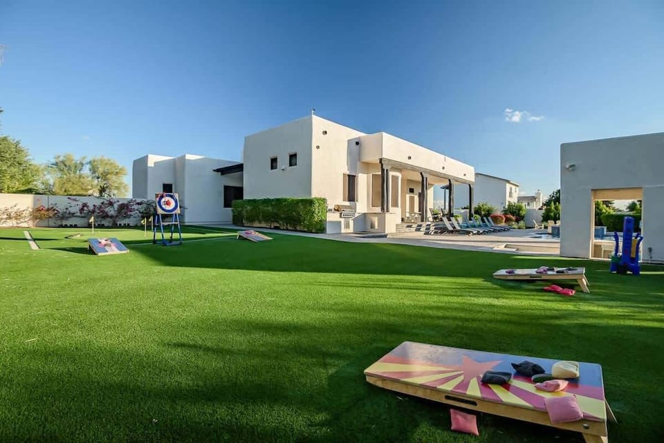 "Challenge your friends or family to a game on our lawn – great times and laughter await with our outdoor games! 🏆🌿"