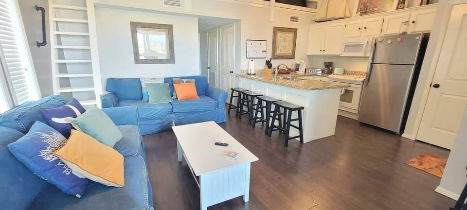 Condo, Multiple Beds, Balcony | Living area | 42-inch flat-screen TV with digital channels