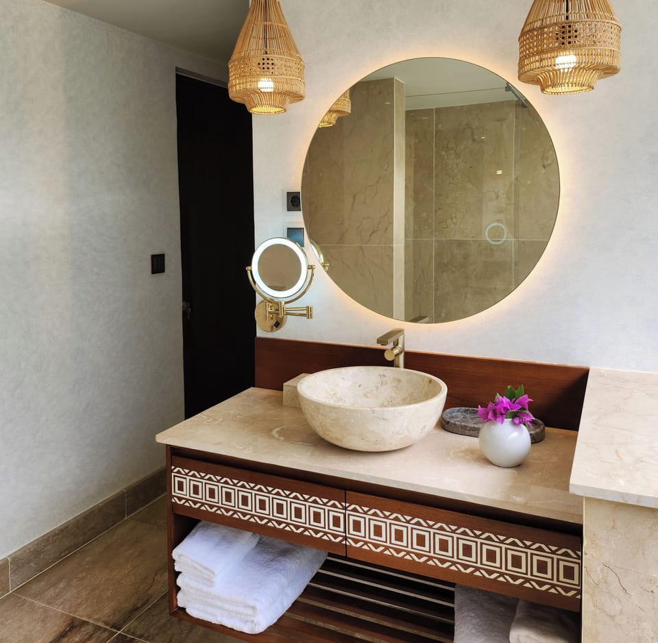 Superior Villa | Bathroom | Separate tub and shower, rainfall showerhead, designer toiletries