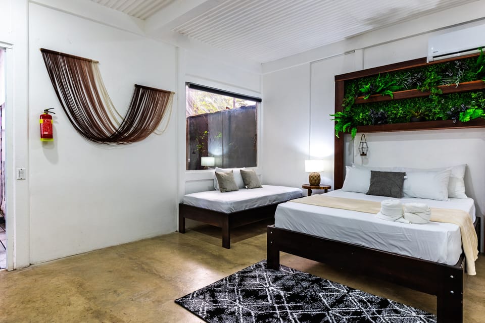 Deluxe Triple Room, Multiple Beds, Non Smoking, Courtyard Area | Premium bedding, pillowtop beds, desk, laptop workspace