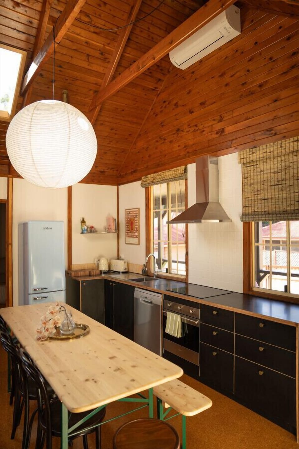 The open-plan kitchen has been modernized for functionality