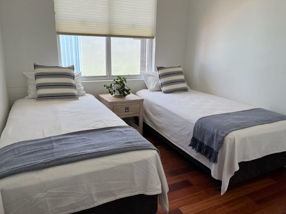 2 x single beds, this room is next to the loungeroom.