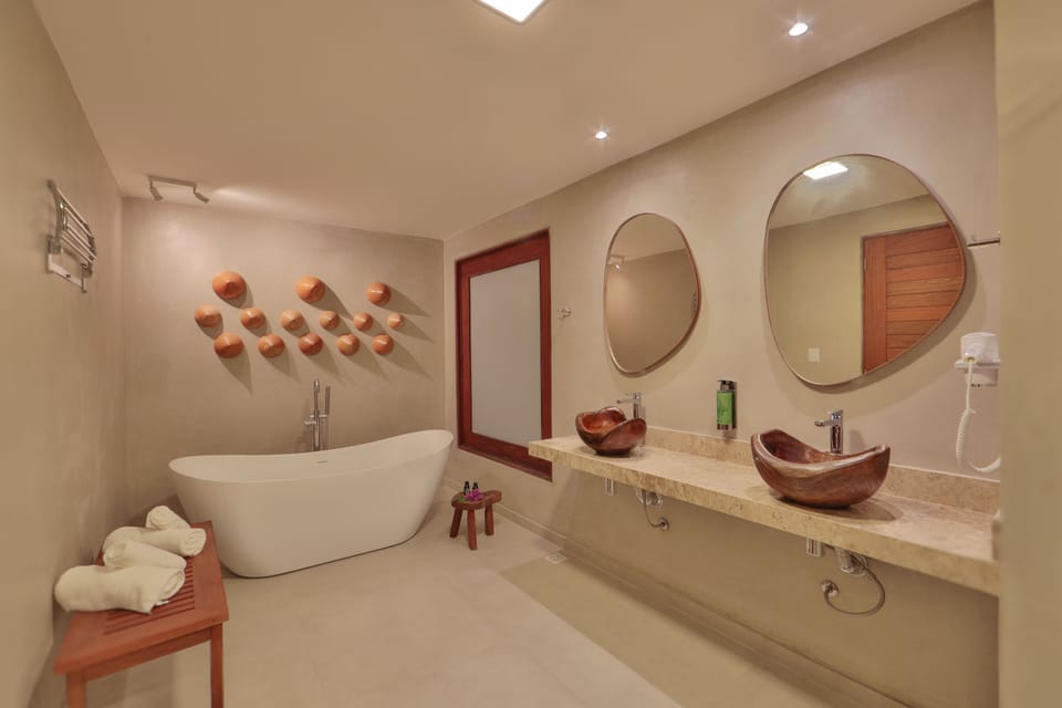 Luxury Bungalow, Ocean View | Bathroom | Designer toiletries, hair dryer, towels, soap