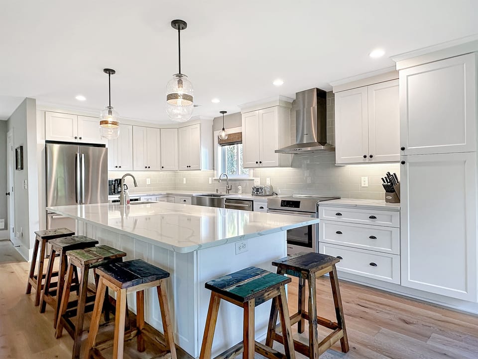 Kitchen with large island with seating for 6. 405 Palm Blvd, Isle of Palms, SC | IOP Escapes