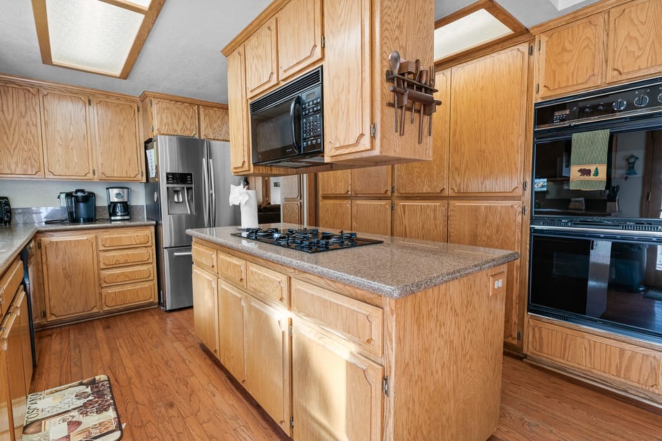 microwave oven, refrigerator/freezer, double oven, keurig and drip coffee makers