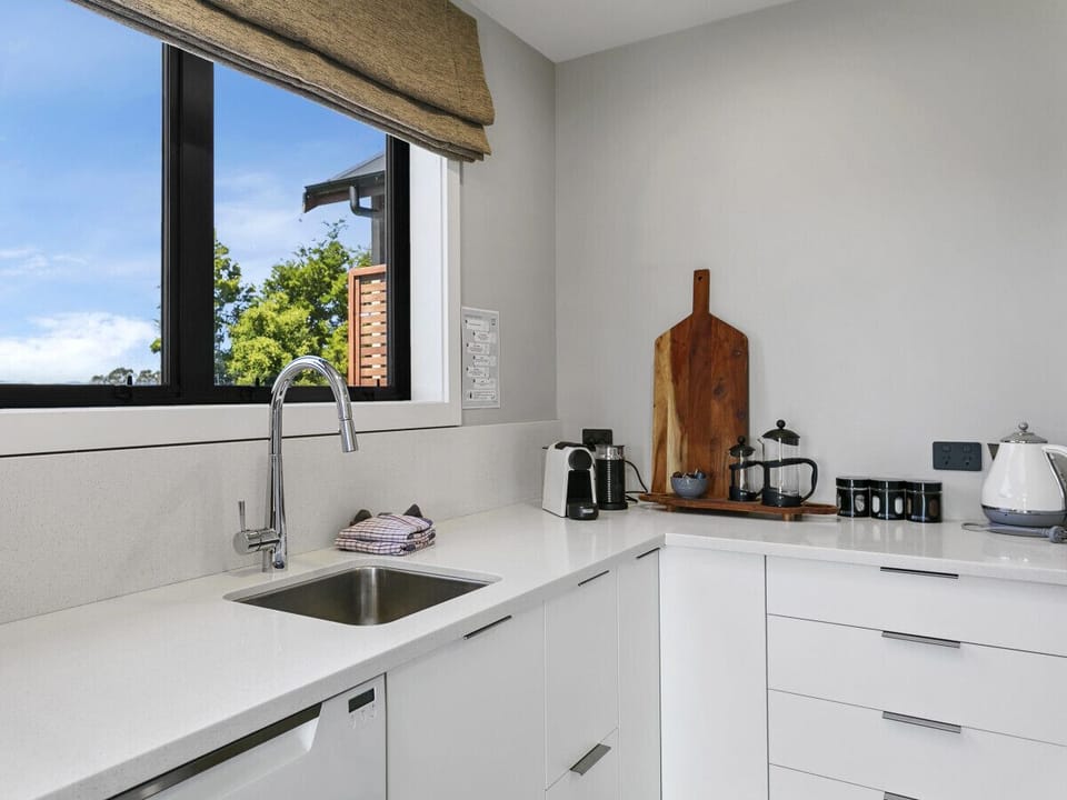Connected to the main kitchen, a well-appointed butler`s pantry.