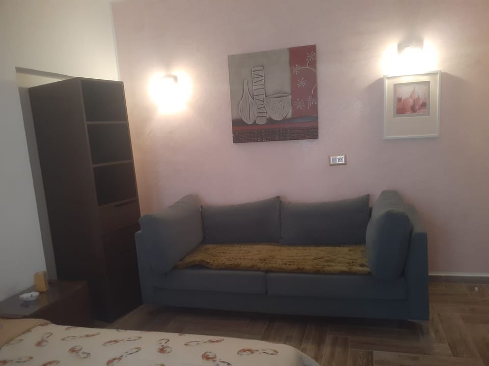 Deluxe Suite, Multiple Bedrooms, Sea View | Living area | 43-inch Smart TV with premium channels, heated floors, computer monitors