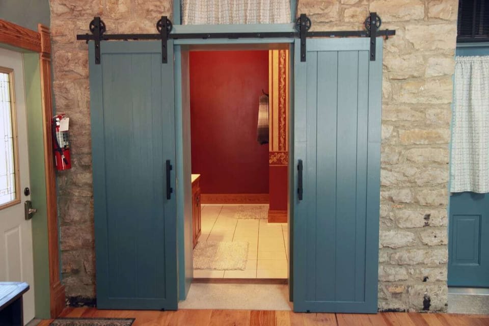 Barndoor bathroom entrance.