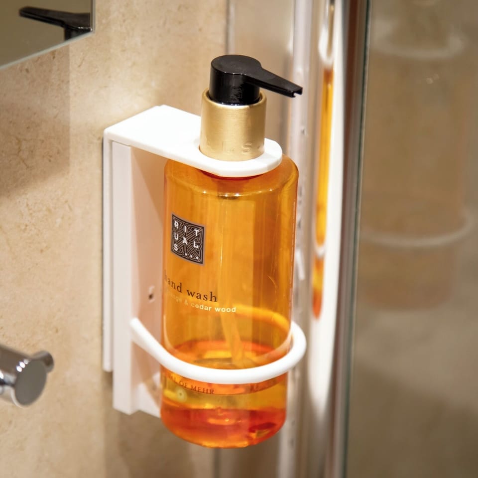 Hair dryer, towels, soap, shampoo