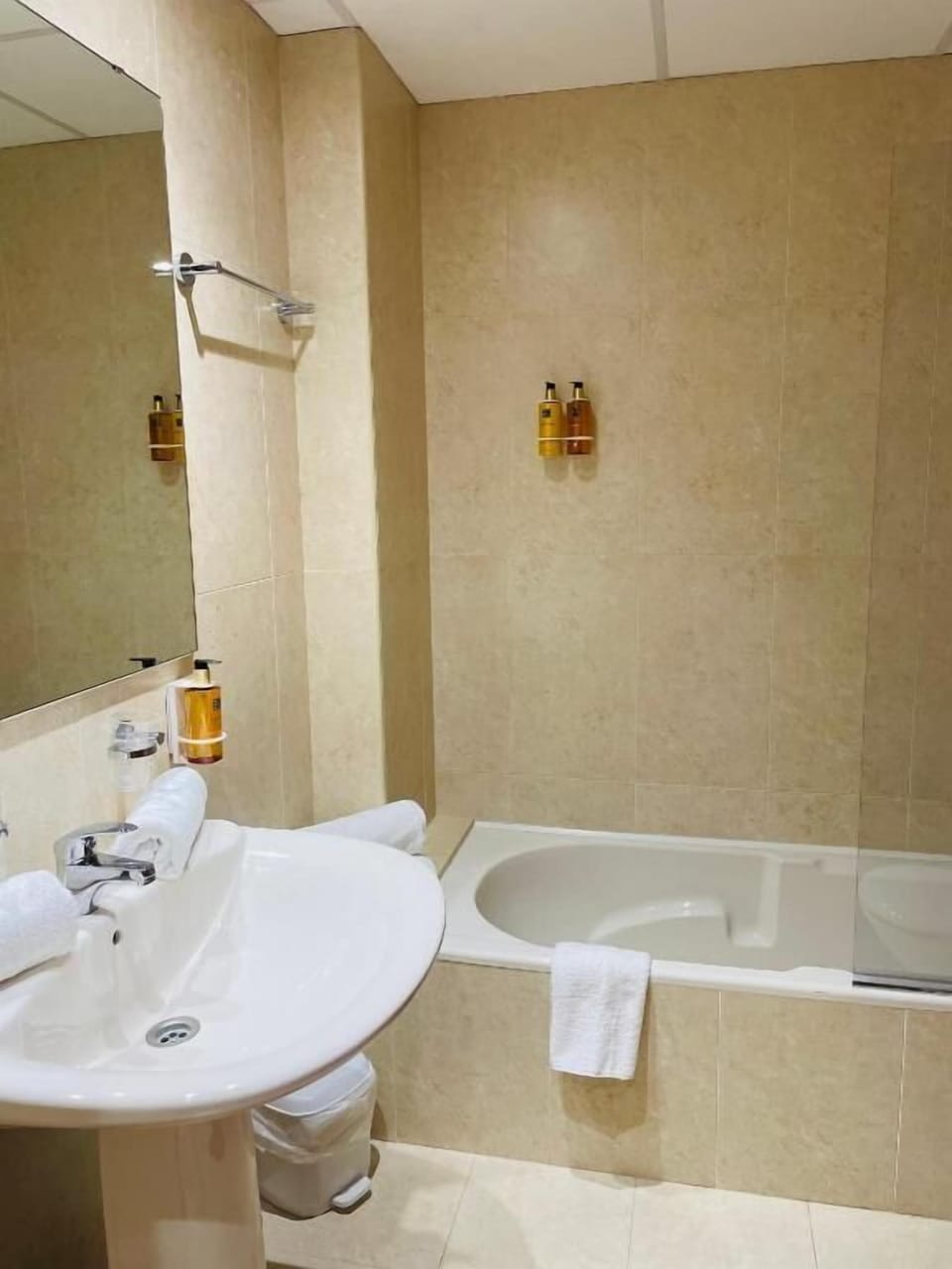 Hair dryer, towels, soap, shampoo