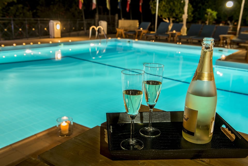 Seasonal outdoor pool, open 9 AM to 3 PM, pool umbrellas, sun loungers