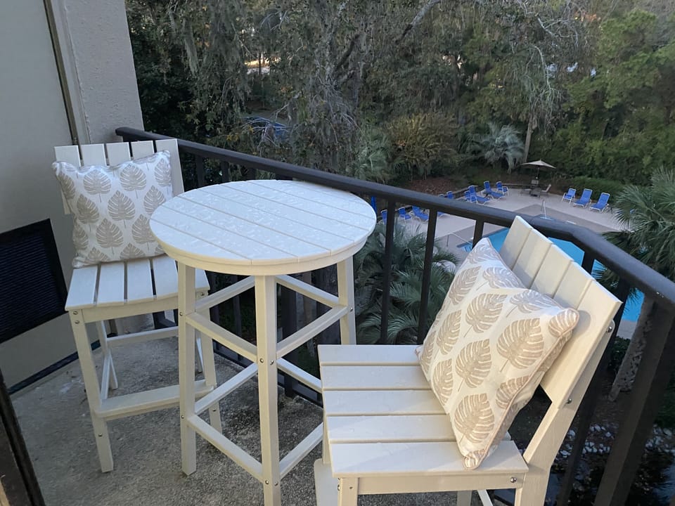 Dine al fresco while overlooking the pool, lagoon and tennis/pickle ball courts.
