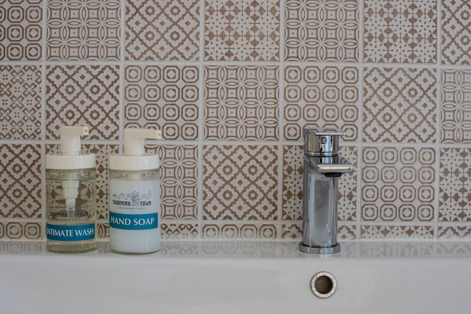 Shower, rainfall showerhead, eco-friendly toiletries, hair dryer