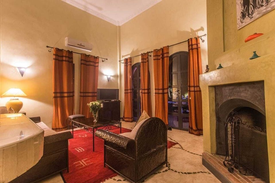 Family Villa | Living area | TV, fireplace, printers