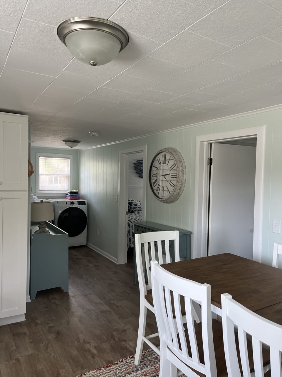Kitchen area and laundry area.