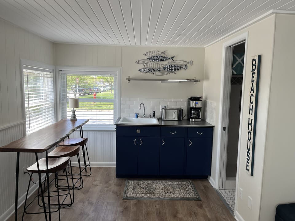 Wet bar, extra eating area or work area.