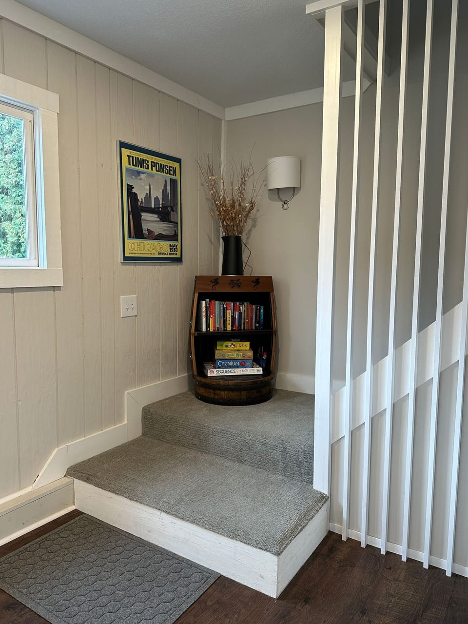 Stairs up to the lofted area. 