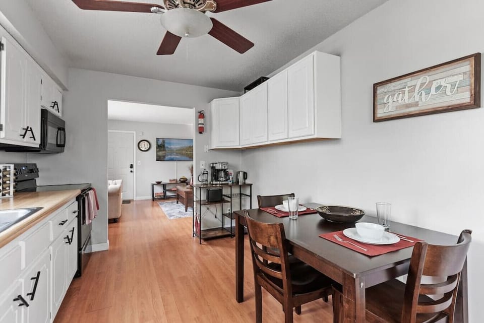 Kitchen View 2 - Everything you need to cook (pots, pans, etc.), dine (plates, cutlery, glasses, etc.) and clean.