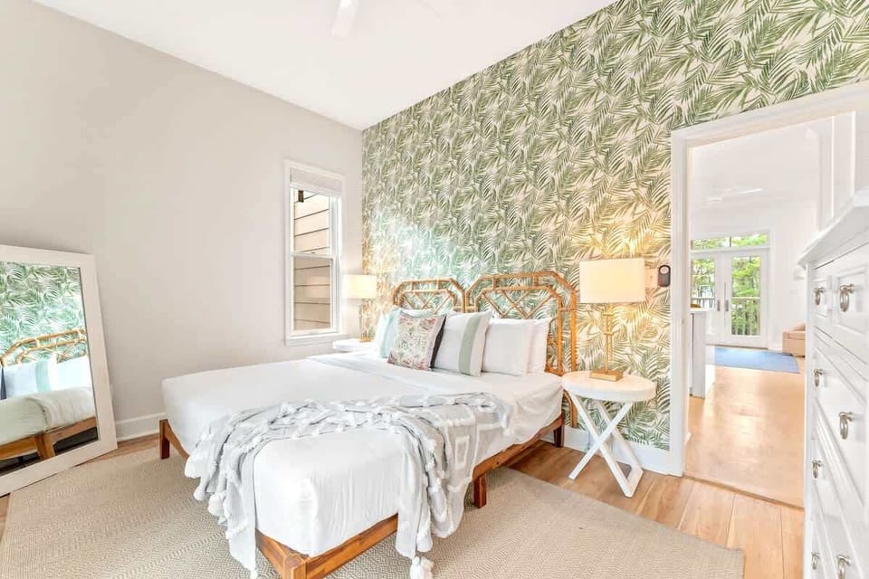 2nd floor bedroom with king bead and ensuite bathroom and balcony.