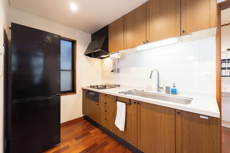 City Villa | Private kitchen | Full-size fridge, microwave, stovetop, coffee/tea maker
