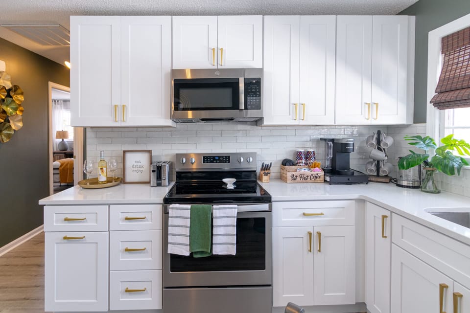 Fully-equipped kitchen with complete sets of cookware
