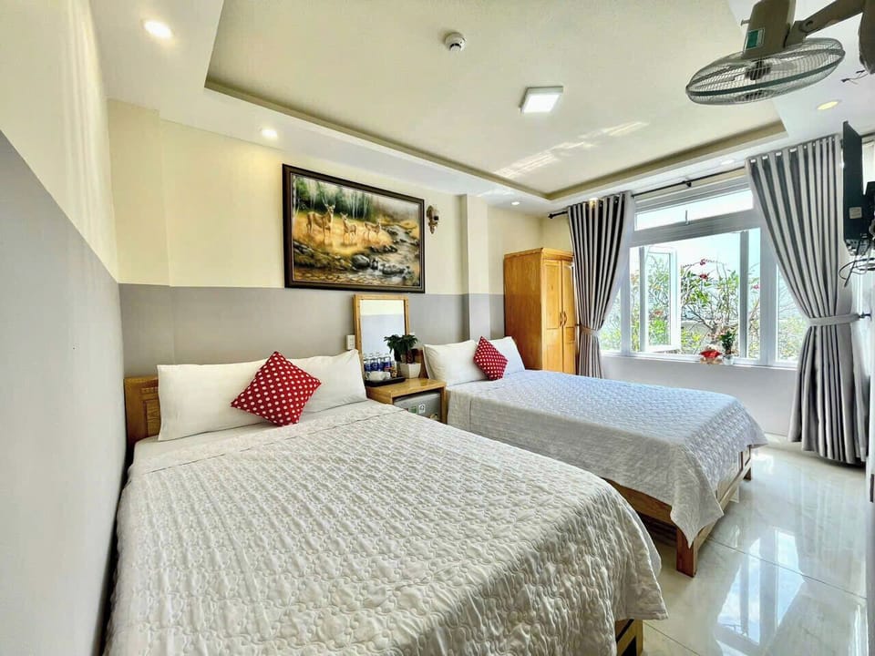 Deluxe Double or Twin Room, 2 Queen Beds, City View | Premium bedding, down comforters, memory foam beds, minibar