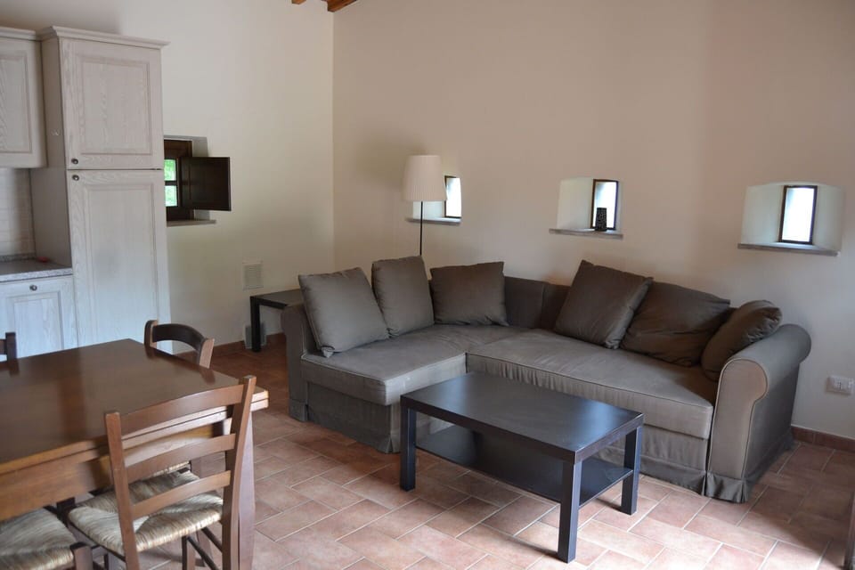 Furniture, Table, Couch, Property, Wood, Picture Frame, Interior Design, Studio Couch, Comfort, Flooring