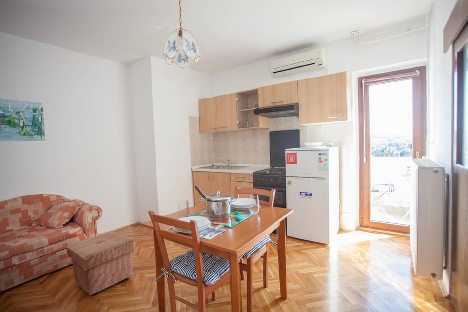Apartment, 1 Bedroom | Private kitchen | Coffee/tea maker, electric kettle