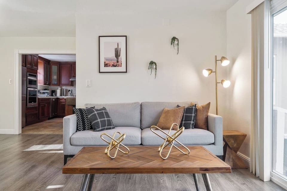 A nice and comfortable couch just close to the dining area.