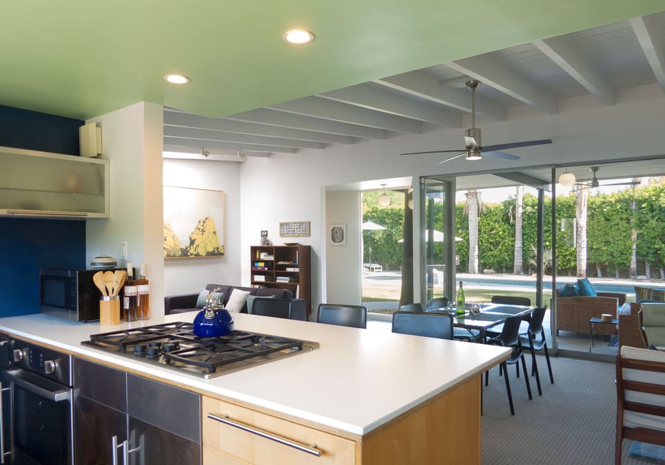 Modern kitchen with large island, gas cooktop, and open entertaining layout