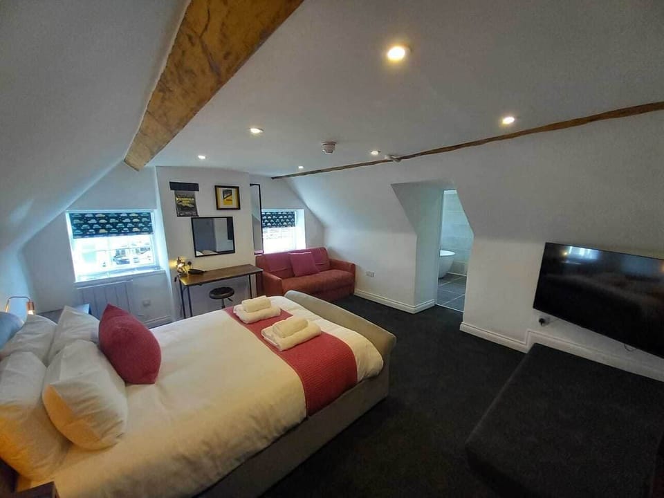 Deluxe Quadruple Room | Premium bedding, memory foam beds, individually decorated
