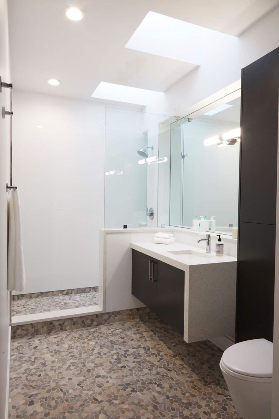 Bathroom with incredible detail and generous stand up shower.