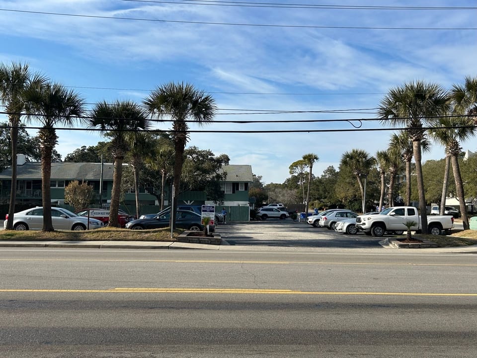 Parking lot is directly across the street from resort