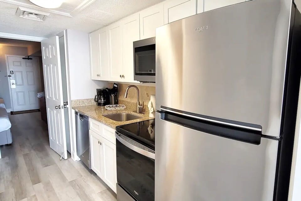 Handy kitchenette stocked for quick bites.