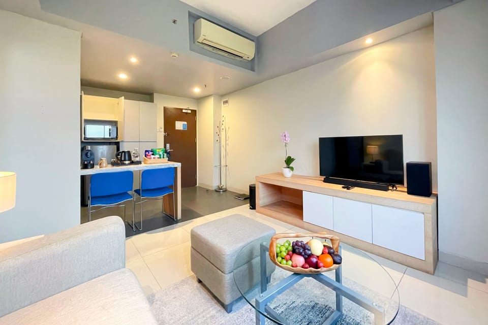 Junior Suite | Living area | 43-inch LCD TV with cable channels