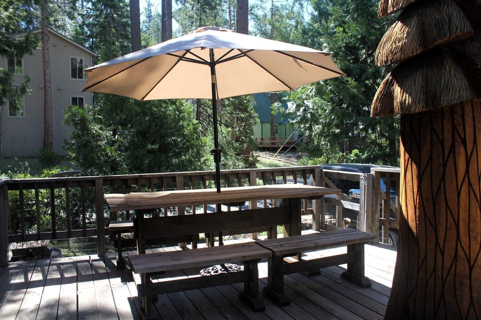 Shaded dining set ready for outdoor meals