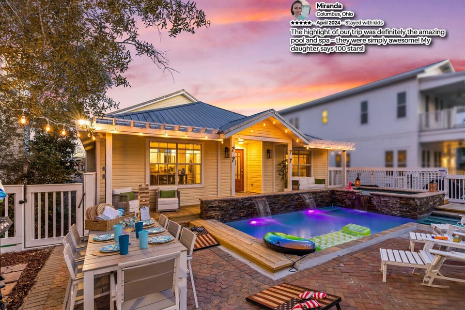 Imagine yourself relaxing on this cozy deck, surrounded by the warm glow of string lights. Curl up with a book in the sitting area.
