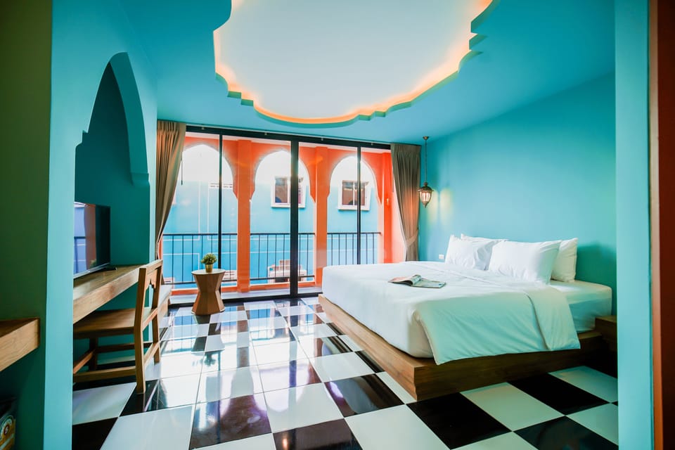 Deluxe Double Room | Minibar, in-room safe, individually decorated, desk