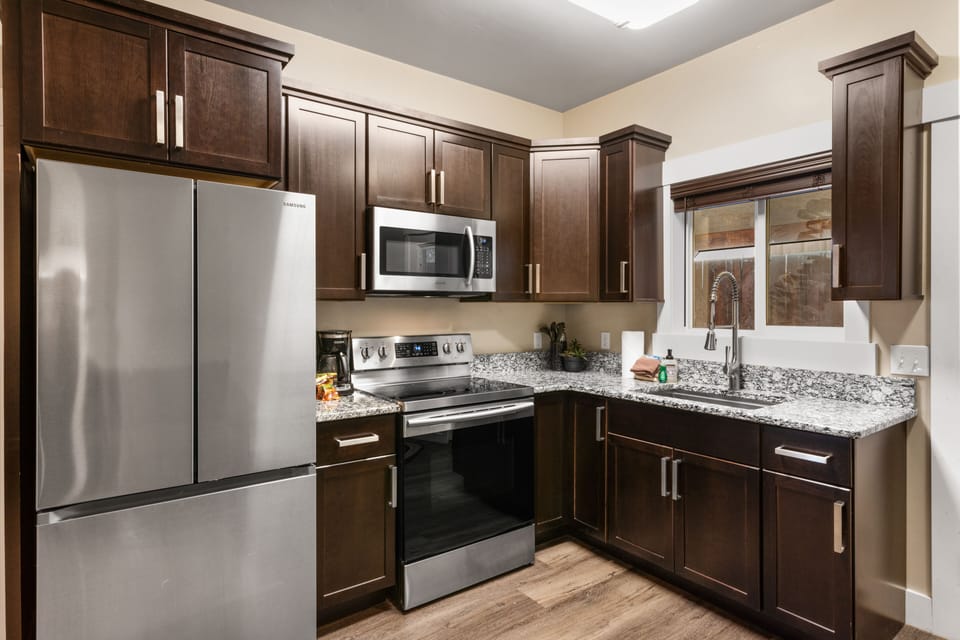 Apartment | Private kitchen | Full-size fridge, microwave, oven, stovetop