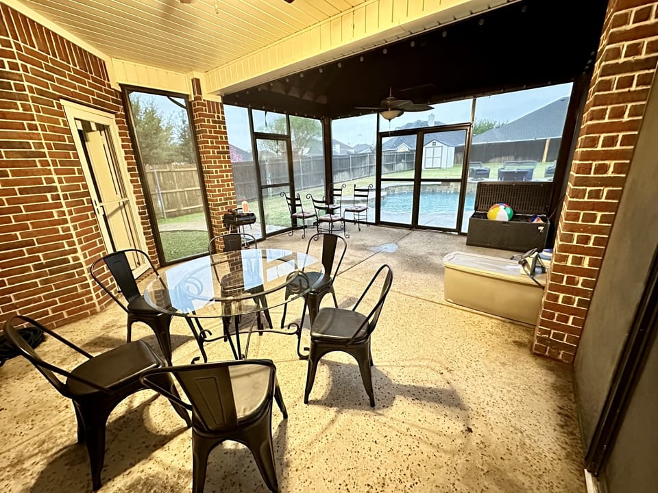 Covered patio in back yard